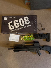 Image for Jing Gong G36 E mit Visier und Trommelmagazin