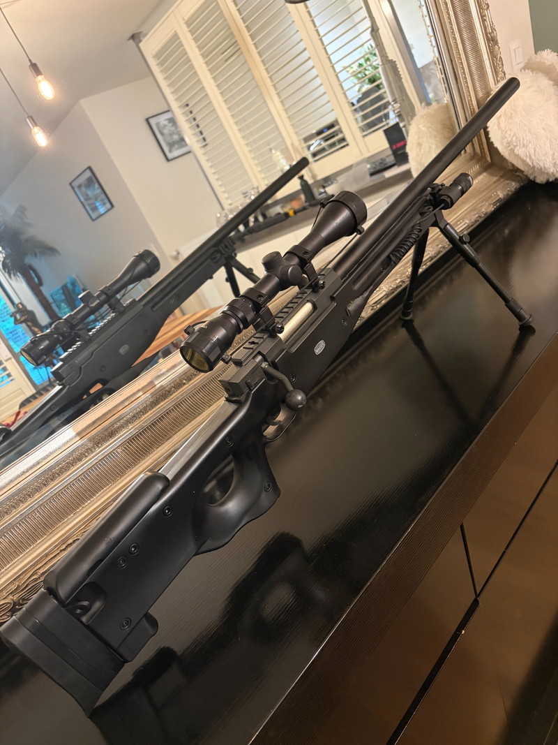 Image 1 for Mauser Sniper met kijker en lamp op