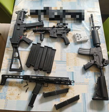 Afbeelding van G&G UMP45 AEG, G&G SMC9 GBB, UMAREX OA15 M4 AEG en SPECNA ARMS RRA STUBBY M4 PISTOL