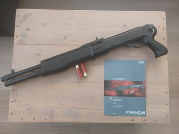 Afbeelding 2 van Franchi SPASS 12 Sportline Tri-shot shotgun van ASG te koop. met extra shotgun shell magazijn