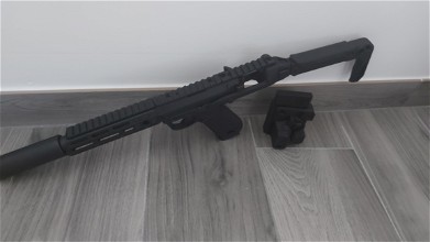 Afbeelding van Aap01 met carbine kit en upgrades.