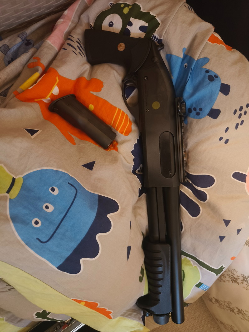 Bild 1 für M870 Breacher Gas Shotgun (GEREZERVEERD)