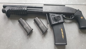 Bild 3 für M870 Breacher Gas Shotgun | Tokyo Marui met M4 adapter