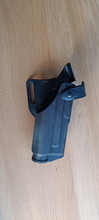 Bild für SLS Holster voor Glock 17/19 met lamp