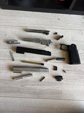 Afbeelding van Hi capa 5.1 stock parts + handmade grip+alu guide plug