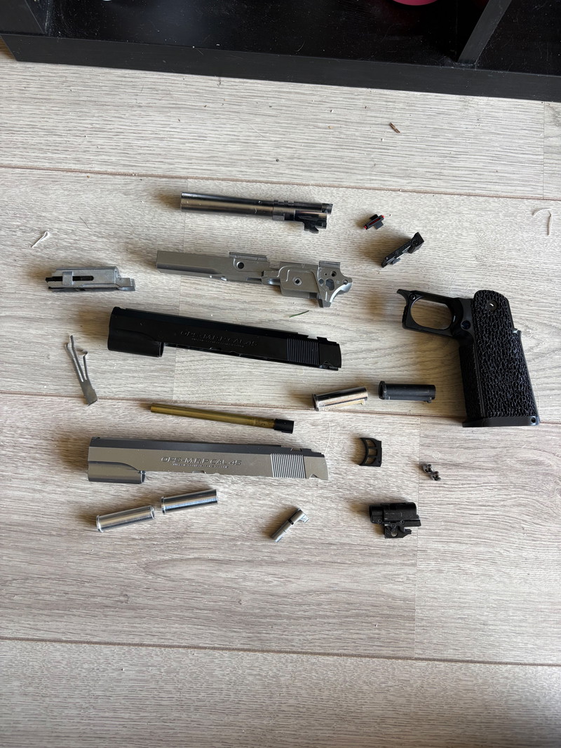 Afbeelding 1 van Hi capa 5.1 stock parts + handmade grip+alu guide plug
