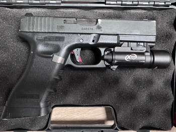 Afbeelding 3 van Tokyo Marui G17 + 3x magazijn & light