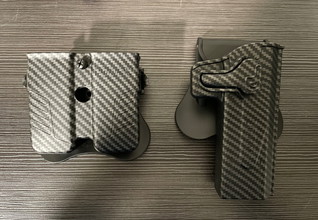 Bild für Carbon look Pistol Holster en universal Mag Holster (AMOMAX)