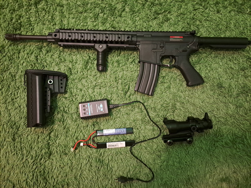 Image 1 for Cyma 612 replic with scope better akumlator charger and a vertical grip