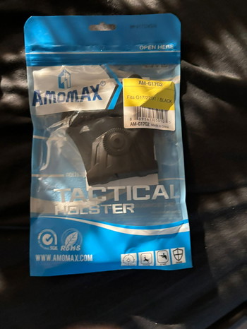 Imagen 4 de Glock 17 gen 5 MOS tekoop met holster en een magazijn.