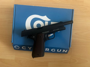 Afbeelding 2 van cybergun 1911a1 nieuw in doos