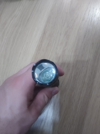 Imagen 3 de Vastfire flashlight (originele kleur zwart, olive drab spray painted).