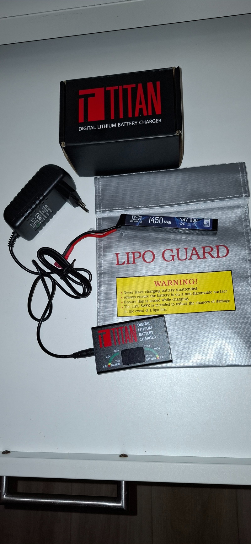 Image 1 for Titan lithium battery charger + battery & lipo guard