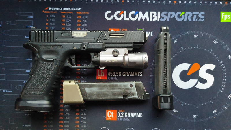 Afbeelding 1 van WTS - Custom TOKYO MARUI GLOCK 34 Gen3 w/ AGENCY ARMS BONESAW SLIDE