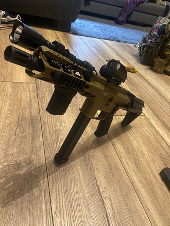 Image 5 for Battle X PDW lancer tactical te koop met upgrades. Let op! Charging handle spring is kapot, heeft verder geen effect op performance van de gun