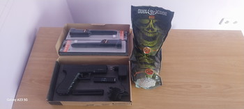 Afbeelding 5 van Pistola de airsoft electrica Glock 18 de la marca Cyma en su caja original + 2 cargadores de 90 bbs nuevos