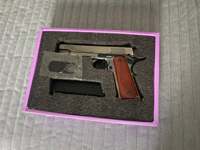 Imagen para Raven 1911 MEU Railed Bronze 1911