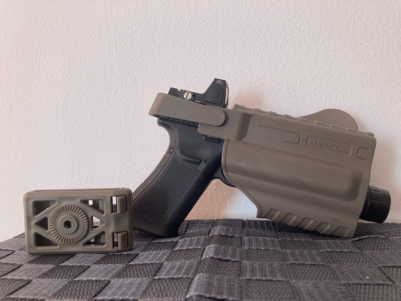 Imagen 1 de Nuprol Glock 17/18/19 series flashlight holster + Amomax belt clip