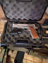 Image pour Cybergun 1911 ( Staal ) + accessoires en cases