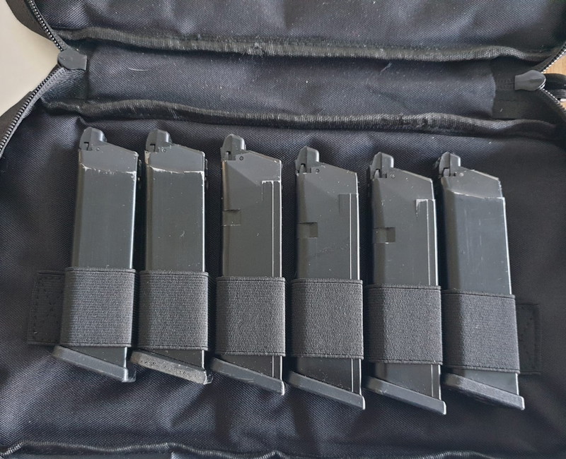 Image 1 for 6 glock mags plus pistooltas