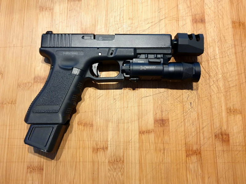 Image 1 for Evolution glock met Ballerina demper en surefire light