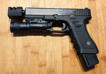 Image 5 for Evolution glock met Ballerina demper en surefire light