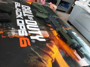 Afbeelding van ICS Swat 556 shorty jungle edition (sig sauer) bekend van black ops 6 zo goed als nieuw!