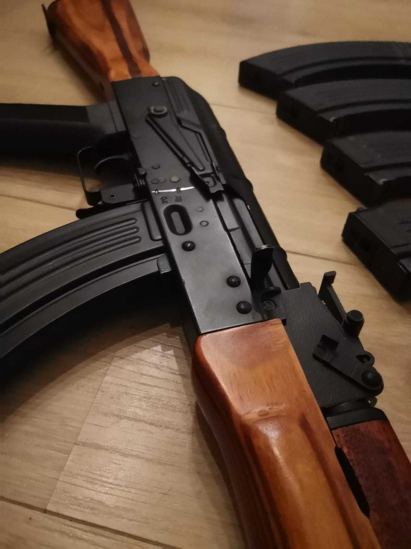 Image 1 for Mooie real wood CM048M AKM, 5 midcaps, 1 hi cap, lipo en rail mount