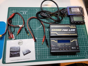 Image for Begadi Ladegerät mit allen Steckern + Akku Tester