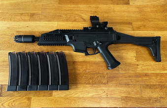 Afbeelding van ASG CZ Scorpion EVO A3 met tal van accessoires