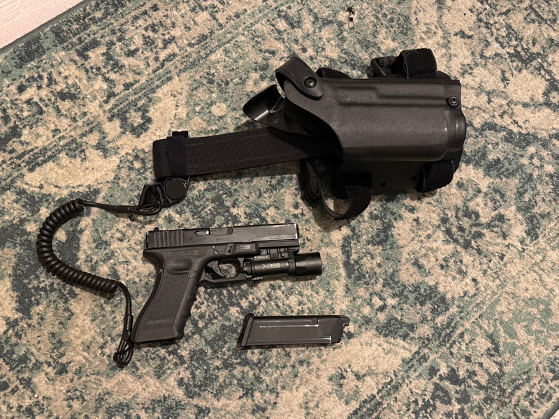 Image 1 pour Umarex Glock 17 Gen4 - X300 - Safari land holster - FMARK