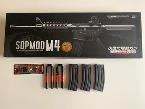 Image pour Te Koop: Tokyo Marui Next-Gen M4 SOPMOD Recoil Shock Zwart
