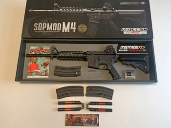 Imagen 2 de Te Koop: Tokyo Marui Next-Gen M4 SOPMOD Recoil Shock Zwart