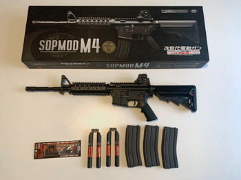 Imagen 3 de Te Koop: Tokyo Marui Next-Gen M4 SOPMOD Recoil Shock Zwart