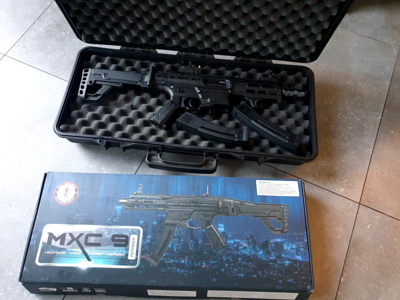 Image 1 for mxc 9  met koffer en 2 mags