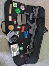 Image for AirsoftM15 armalite ASG included gun bag, badges, scope, sling, BB loader, one magazine, two batteries for scope, charger, battery for gun and BBs with it. Just want to get rid of it asap