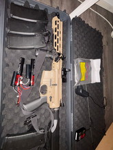 Image for KWA Ronin T10 + 2 batterijen en lader 7 magazijnen lipo zak, geweerriem, scope, scope bescherm glas. koffer