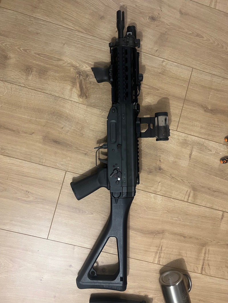 Image 1 for GHK SIG with multiple spares and Handguards