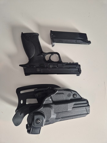 Afbeelding 2 van M&P9 pistol + real steel holster