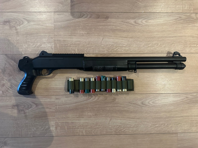 Image 1 for Pump Shotgun with 10 Shells Works Perfect.Trades Possible