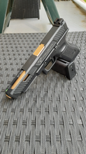 Image pour Tokyo Marui Glock 17 gen 3 met Nova Taran Tactical Glock 34 slide