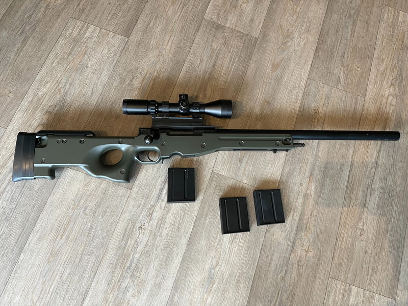 Bild 1 für Vente L96 Marui comme neuf + lunette + rehausse Marui neuf + 2 Chargeurs Marui neuf