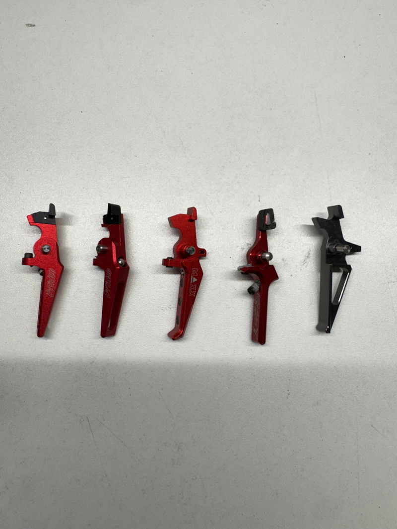 Image 1 for 5 triggers van verschillende merken