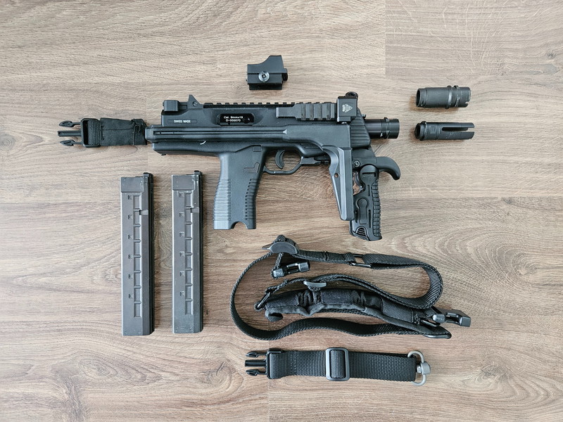 Image 1 for KWA MP9, 2 mags, 14mm CCW barrel (Lee's Precision), UTC QD low profile sling point, two point quick control sling, inklapbare front grip, Red dot sight