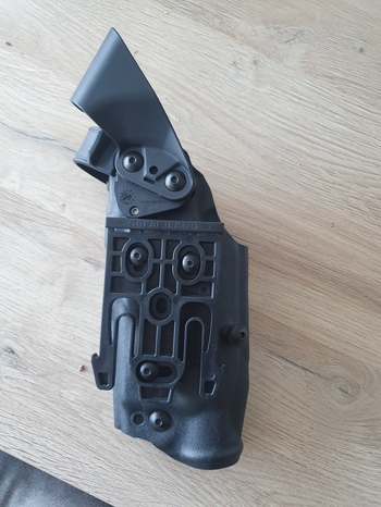 Imagen 3 de Safariland holster voor Glock 17/19/23 met wapenlamp. + QLS-vork