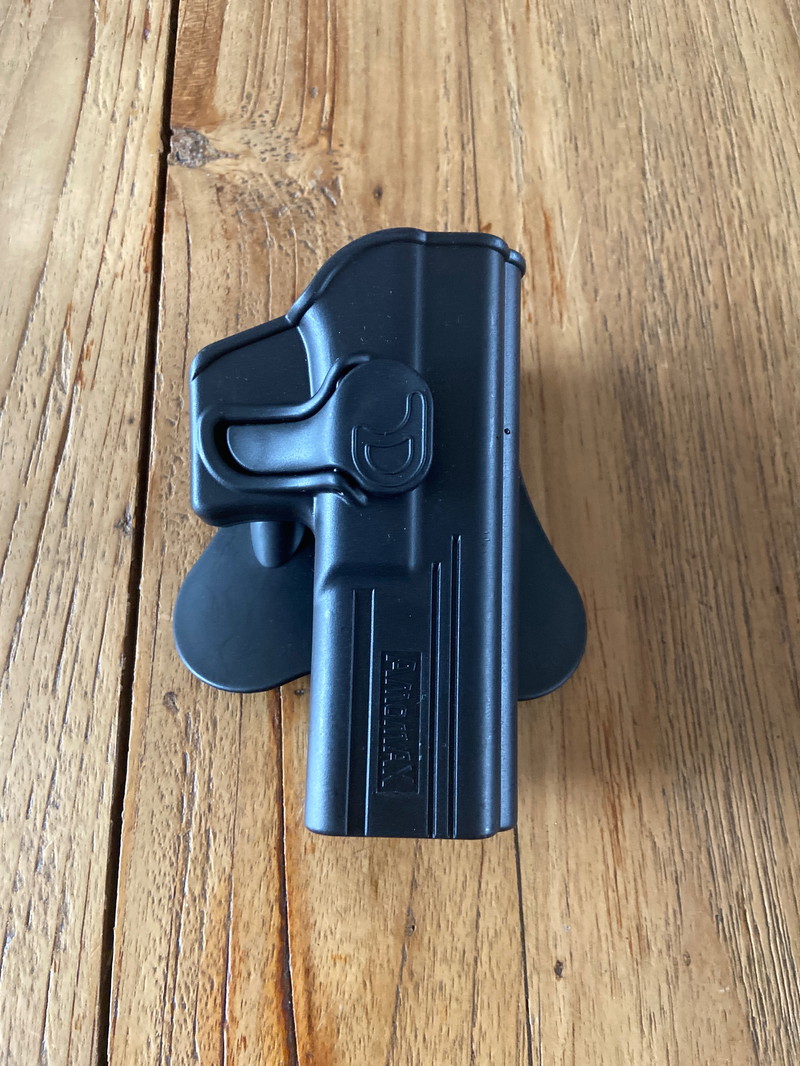Image 1 for Amomax Glock 17 holster + Molle adapter