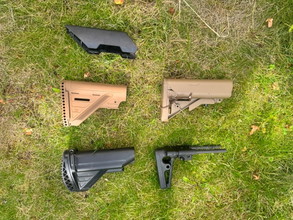Image for Stocks, suppressors, rails, mag pouches, holsters