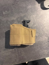 Afbeelding van Warrior assault systems universal holster links handig