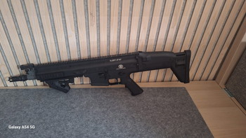 Bild 2 für Verkaufe Begadi MK16 Sport SCAR-L Upgrade S-AEG. Verbaut ist eine FNS Hop-Up Unit mit einem FX5-Setup