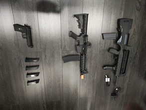 Imagen para Bulkverkoop: Cybergun FAMAS - Golden Eagle M4 CQBR GBBR (MC6624) - WE Beretta M9